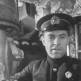 Командир советской подводной лодки Щ-303 капитан 3-го ранга И.В. Травкин у перископа Фото