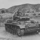 Танк Pz.Kpfw.III Африканского корпуса вермахта форсирует речку в Тунисе Фото