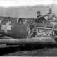 Советские летчики рассматривают сбитый румынский истребитель IAR-81C Фото
