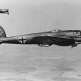 Бомбардировщик Хейнкель He-111 летит в сопровождении истребителя Хейнкель He-100 Фото
