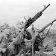 Советские пулеметчики ведут огонь по самолету из трофейного пулемета MG 37(t) и СВТ-40 Фото