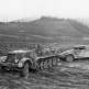 Трофейная немецкая эвакуационная машина на базе тягача Sd. Kfz.7 буксирует БТР M3 «Скаут» Фото
